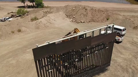 "We build the wall" ad